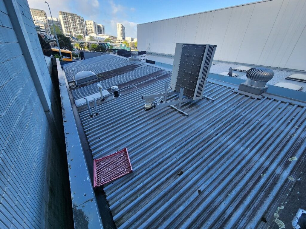 Roof Painting in CBD, Auckland — Goliath Coatings — photo 7