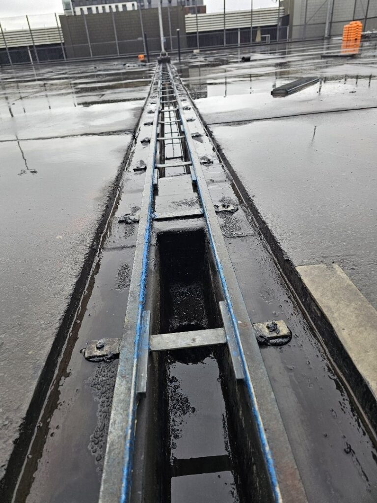 Roof Membrane Waterproofing in ASB Tennis Lane, Auckland — Goliath Coatings — photo 10