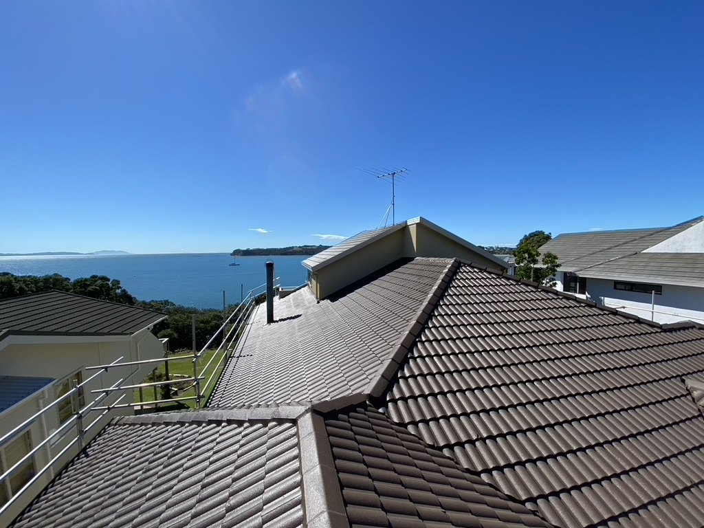Recoated tile roof after Goliath Coatings roof restoration — Auckland